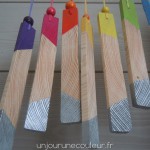 Suspensions tranches de planche en bois peint